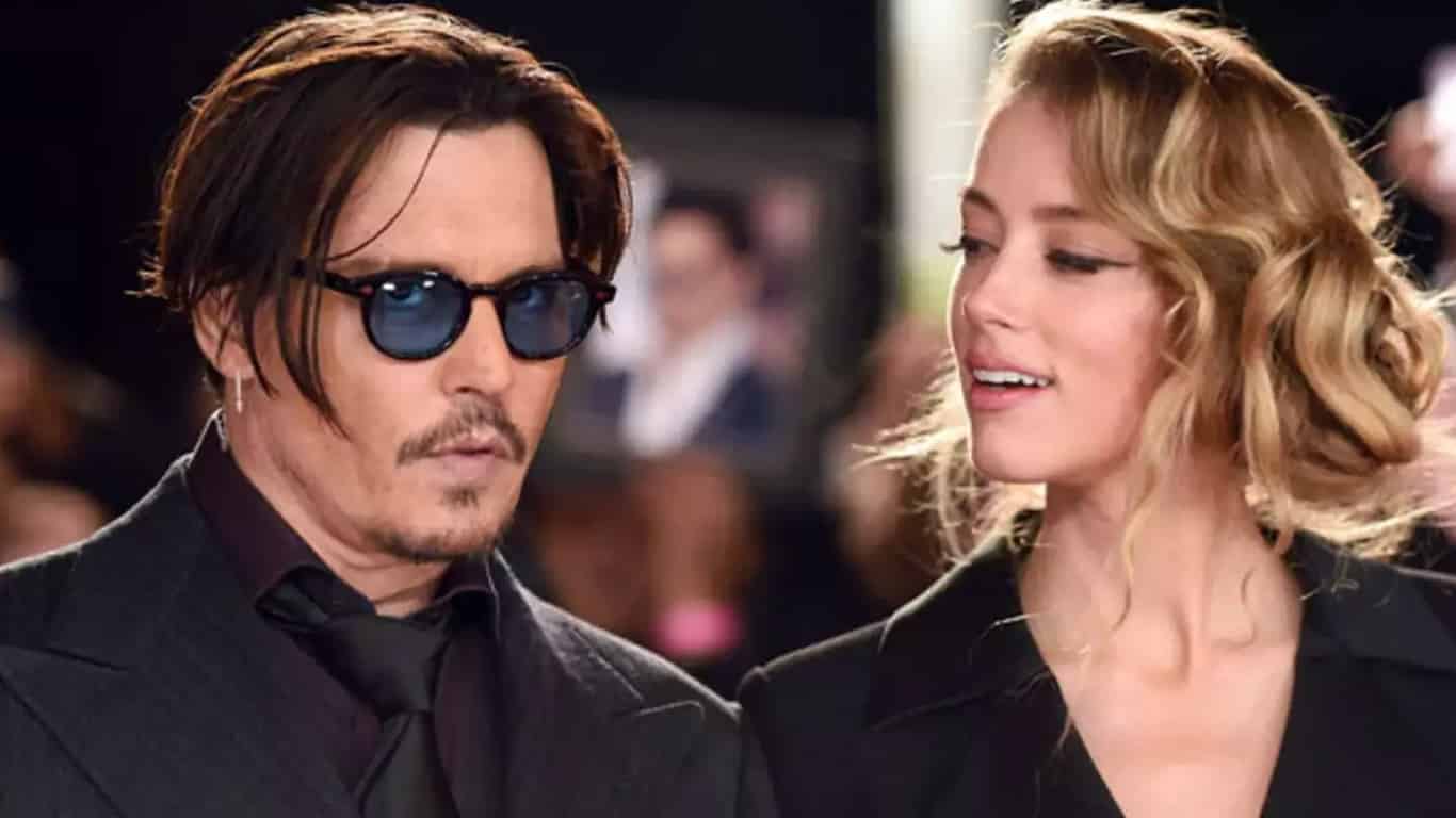 Johnny-Depp-Amber-Heard Amber Heard fala sobre suposta traição a Johnny Depp com ator de 'Animais Fantásticos'