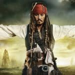 Johnny Depp aparece com acessório de Jack Sparrow em show